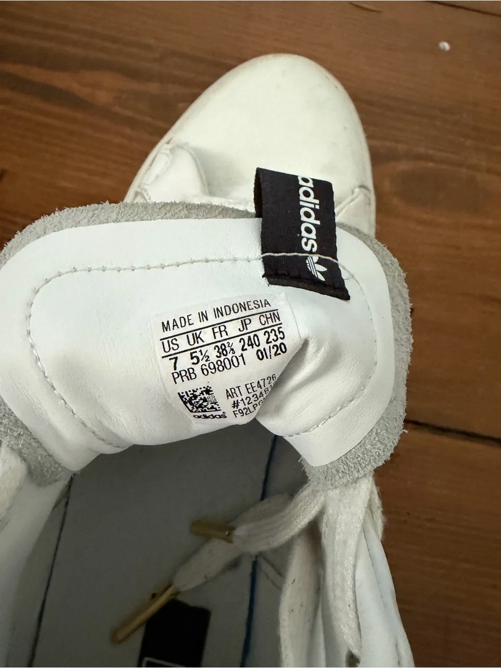 adidas White High-Top Leather Sneakers with Gold Logo